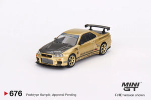 (Preorder) Mini GT 1:64 Nissan Skyline GT-R (R34) Top Secret – Gold – Japan Exclusive