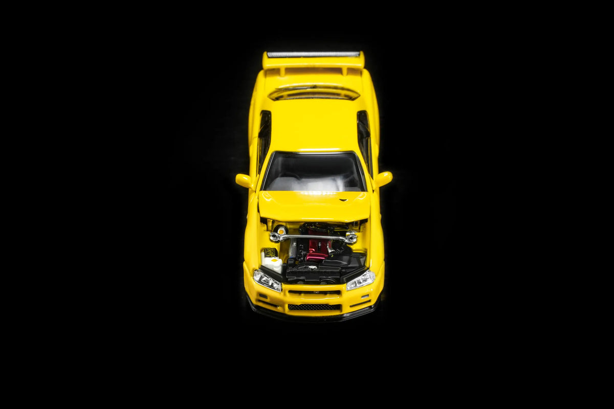 MotorHelix 1/64 Nissan Skyline GT-R R34 V-SPEC II Yellow