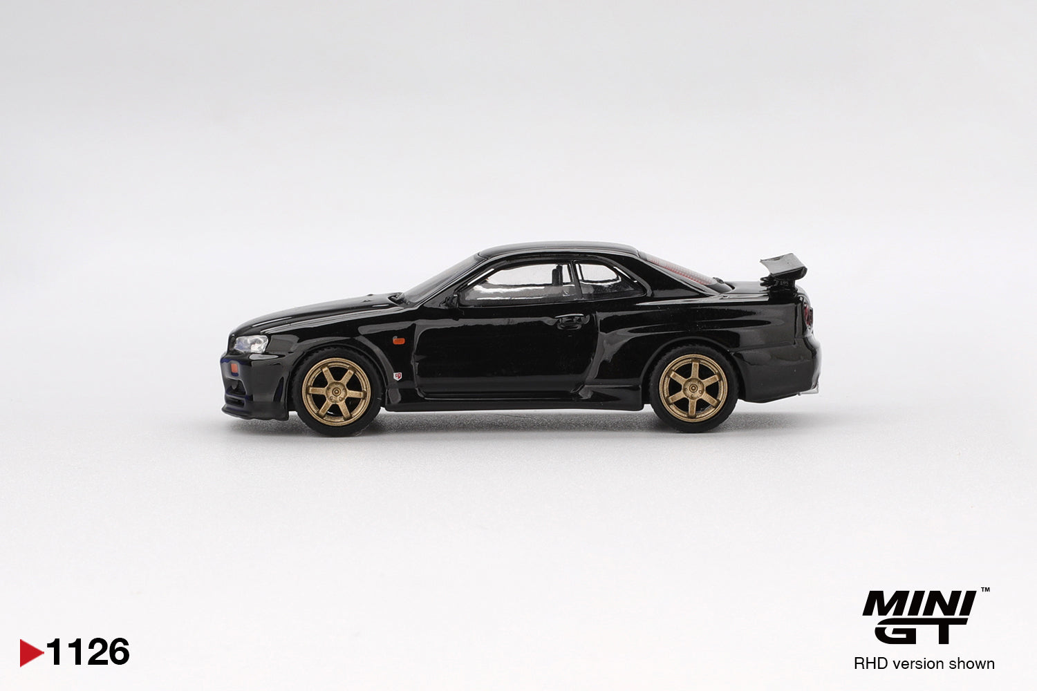 Mini GT 1:64 Nissan Skyline GT-R (R34) V.Spec Black Pearl W/ TE37