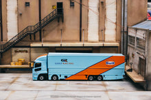 Load image into Gallery viewer, Tarmac Works 1:64 Mitsubishi Fuso Super Great GULF Racing Transporter