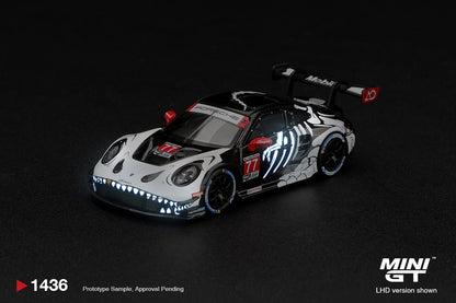 Mini GT 1:64 Porsche 911 GT3 R (992) #77 AO Racing "Skeleton Rexy" 2026 IMSA Petit Le Mans