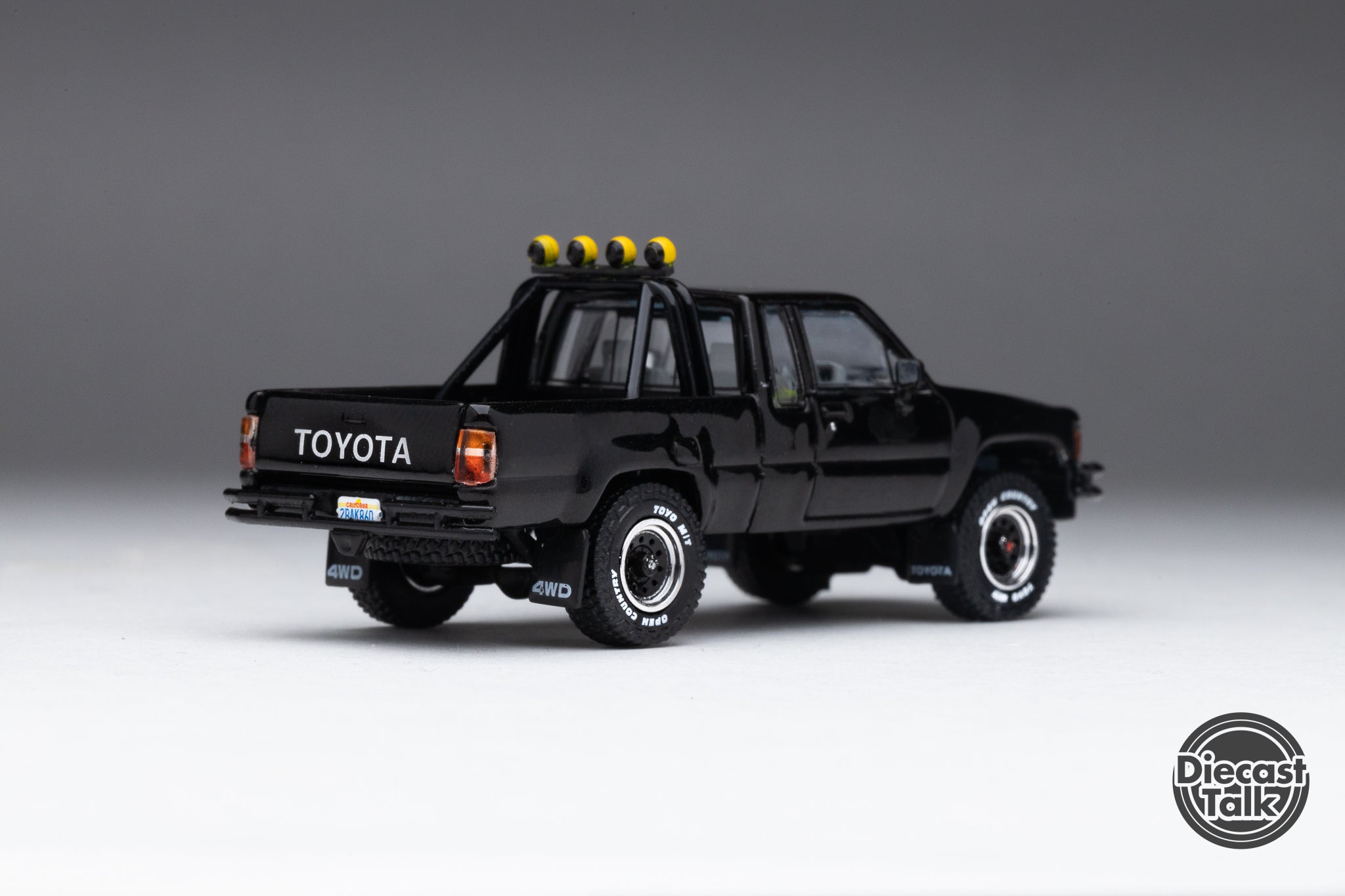 GCD DiecastTalk Exclusive 1/64 Toyota 1985 Hilux SR5 Xtracab Black Ltd