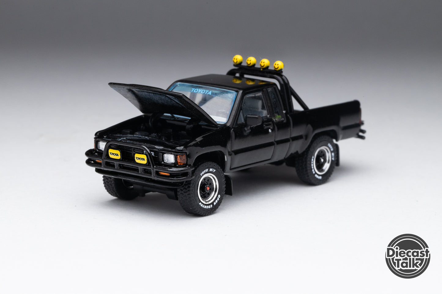 (Bundle) DiecastTalk 1/64 Toyota Hilux SR5 Xtracab Black + Secret Car