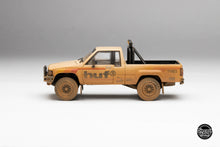 Load image into Gallery viewer, HUF x DiecastTalk 1/64 Toyota Hilux SR5 4x4 with skateboard