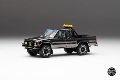 DiecastTalk MDX Exclusive 1/64 Toyota 1985 Hilux SR5 4x4 Black Chrome