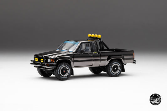 DiecastTalk MDX Exclusive 1/64 Toyota 1985 Hilux SR5 4x4 Black Chrome