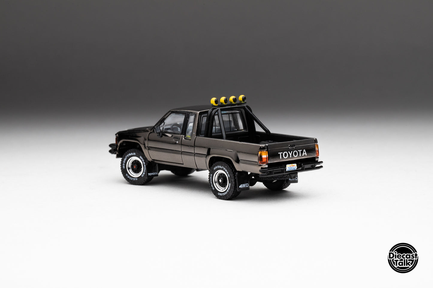 DiecastTalk MDX Exclusive 1/64 Toyota 1985 Hilux SR5 4x4 Black Chrome