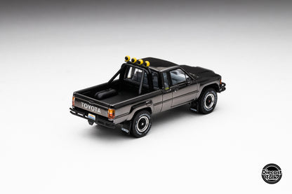 DiecastTalk MDX Exclusive 1/64 Toyota 1985 Hilux SR5 4x4 Black Chrome