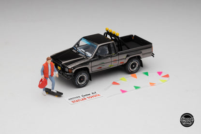 DiecastTalk MDX Exclusive 1/64 Toyota 1985 Hilux SR5 4x4 Black Chrome