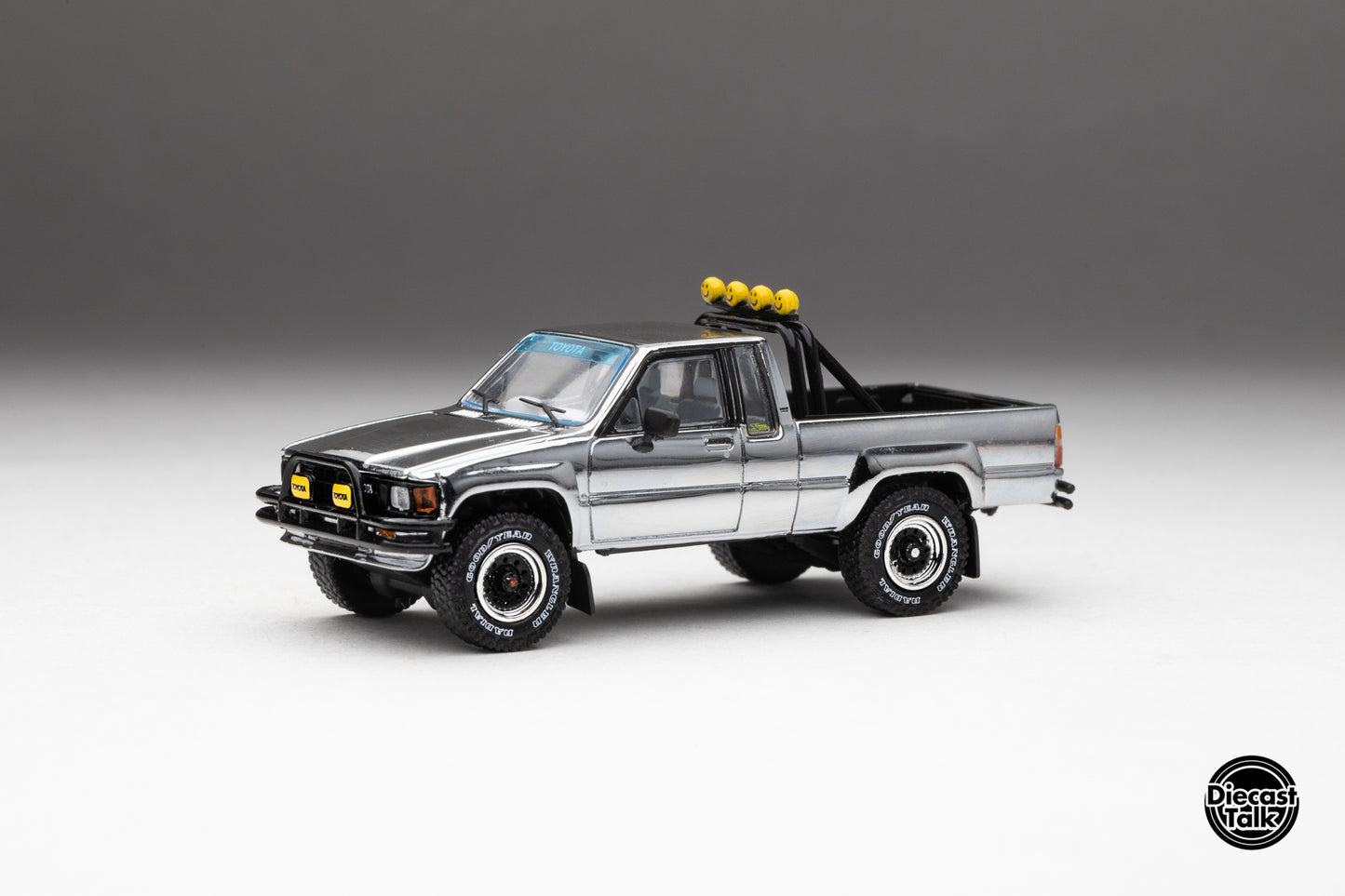 DiecastTalk MDX Exclusive 1/64 Toyota 1985 Hilux SR5 4x4 Black Chrome