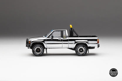 DiecastTalk MDX Exclusive 1/64 Toyota 1985 Hilux SR5 4x4 Black Chrome