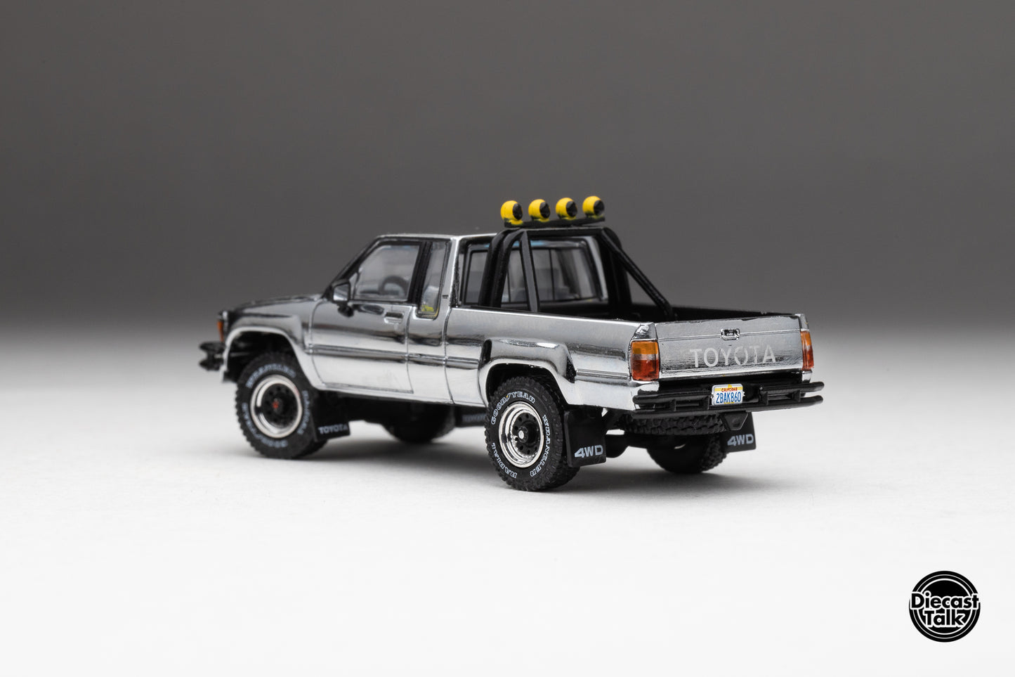 DiecastTalk MDX Exclusive 1/64 Toyota 1985 Hilux SR5 4x4 Black Chrome