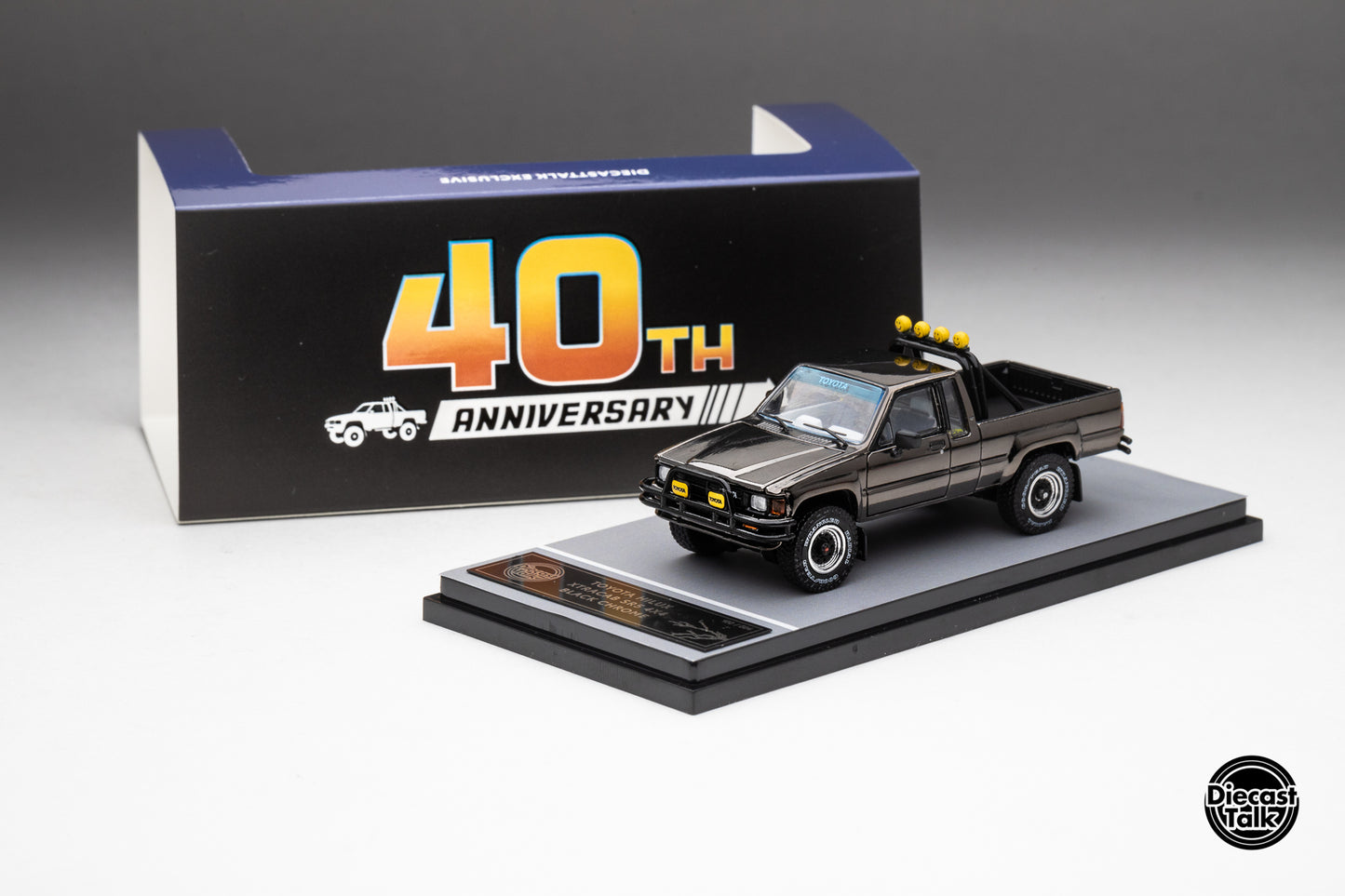 DiecastTalk MDX Exclusive 1/64 Toyota 1985 Hilux SR5 4x4 Black Chrome