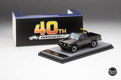 DiecastTalk MDX Exclusive 1/64 Toyota 1985 Hilux SR5 4x4 Black Chrome