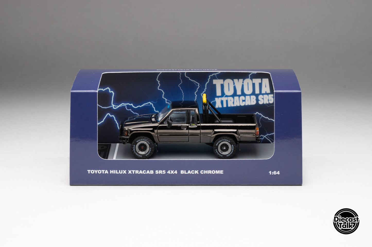 DiecastTalk MDX Exclusive 1/64 Toyota 1985 Hilux SR5 4x4 Black Chrome