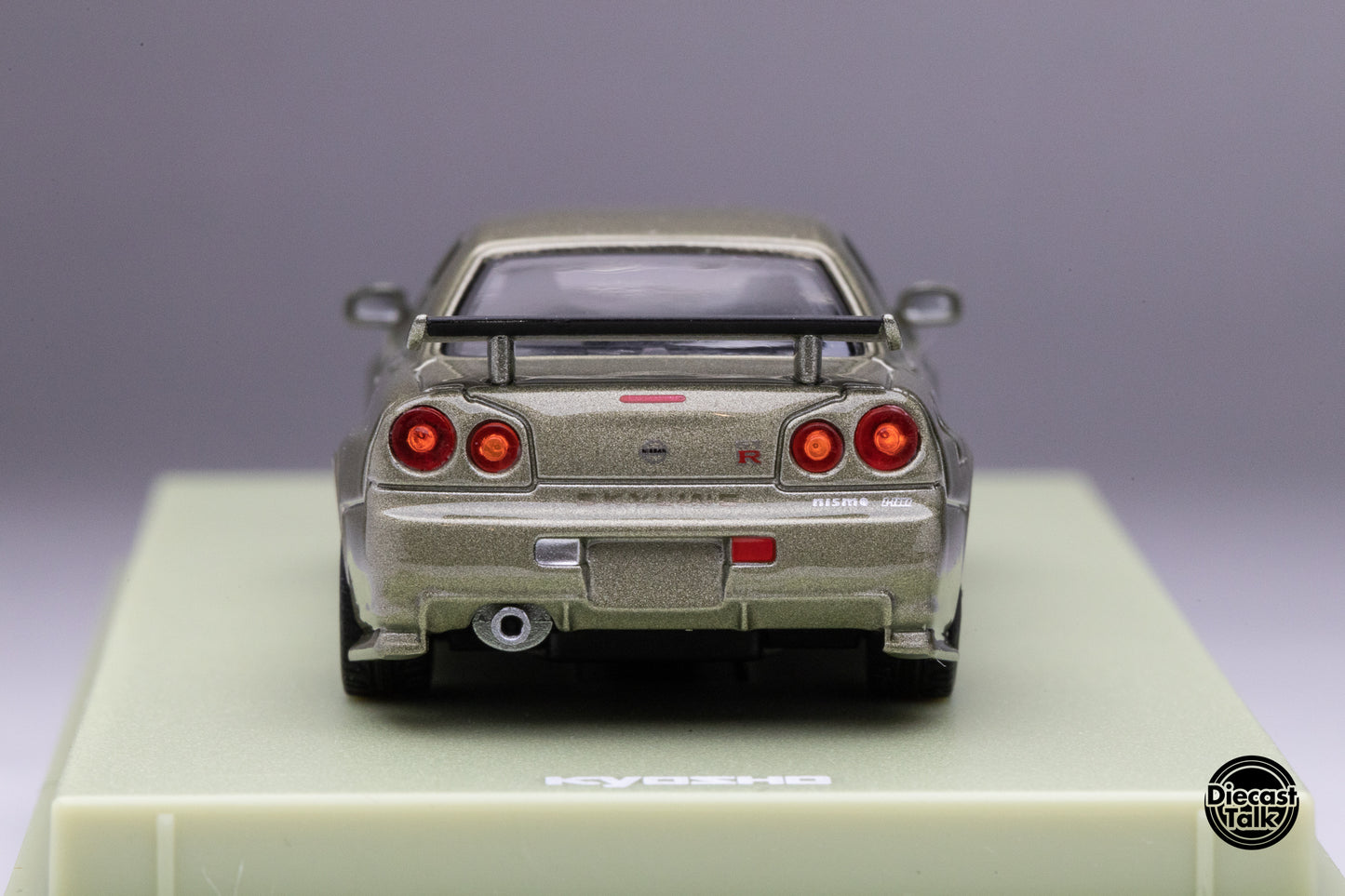 DiecastTalk Exclusive Kyosho 1/64 Nissan Skyline R34 GT-R Millenium Jade MOTN Compatible