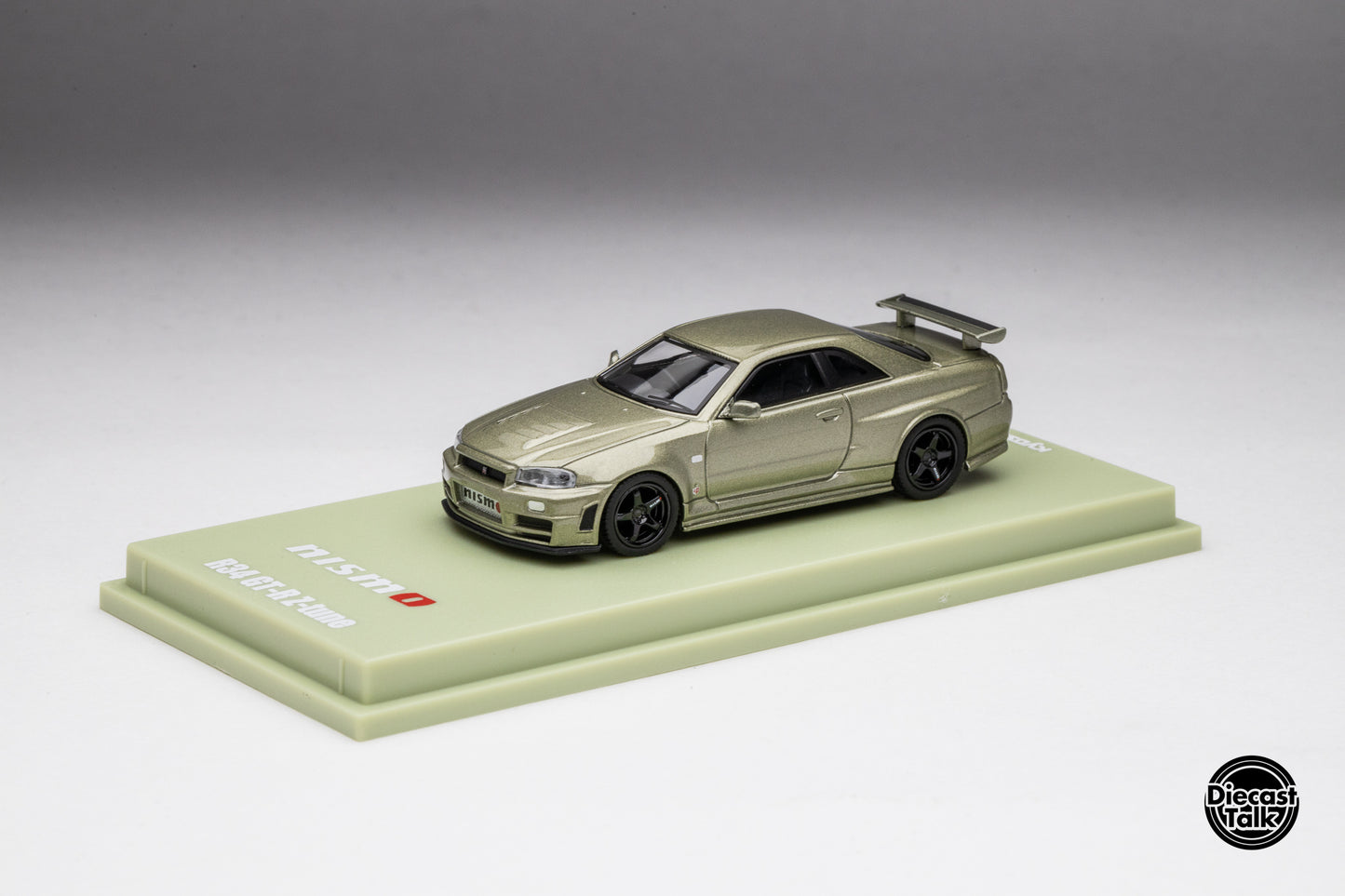 DiecastTalk Exclusive Kyosho 1/64 Nissan Skyline R34 GT-R Millenium Jade MOTN Compatible