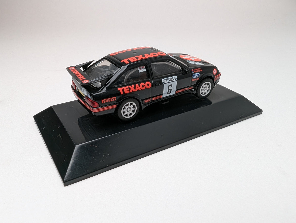 KYOSHO 1:64 USA Minicar Collection Ford Sierra RS Cosworth 1987 1000Lakes (Black)