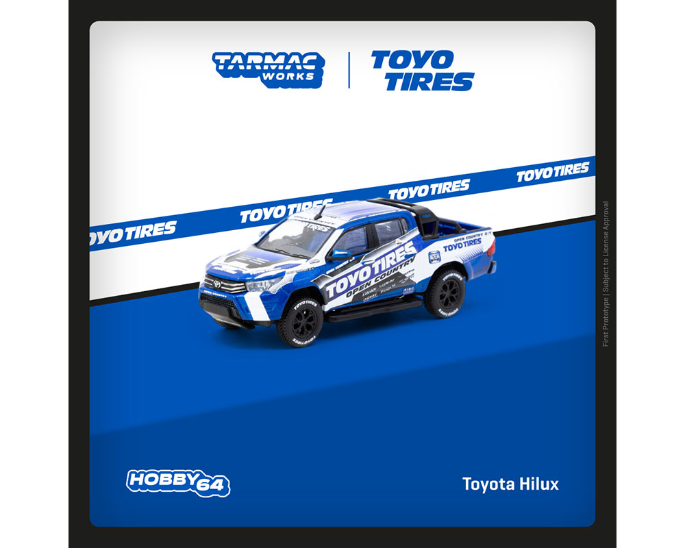 (Preorder) Tarmac Works 1:64 Toyota Hilux TOYO Tires – Blue with Graphics – Hobby64