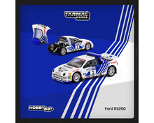 Load image into Gallery viewer, (Preorder) Tarmac Works 1:64 Ford RS200 Lombard RAC Rally 1986 Stig Blomqvist / Bruno Berglund – Red – Road64