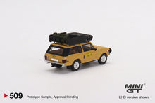 Load image into Gallery viewer, (Preorder) Mini GT 1:64 Range Rover 1982 Camel Trophy Papua New Guinea Team USA (RHD)