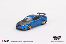 Load image into Gallery viewer, Mini GT 1:64 Nissan Skyline GT-R (R34) Top Secret Bayside – Blue – Mijo Exclusives